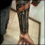 CraiovaForum si Tattoo Piercing Sfinx va invita la concurs - 10 vouchere pentru tatuaje!!-terminator-arm-tattoo-jpg