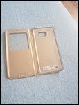 Huse  S7 edge flip originala de culoare gold  + una de S8 .-36883430_1782313441862883_8507808666907312128_n-jpg